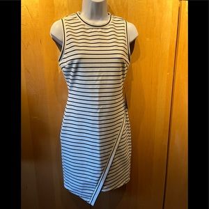 Brand New w Tag! Olivia Grey dress. Wmns size XSM.